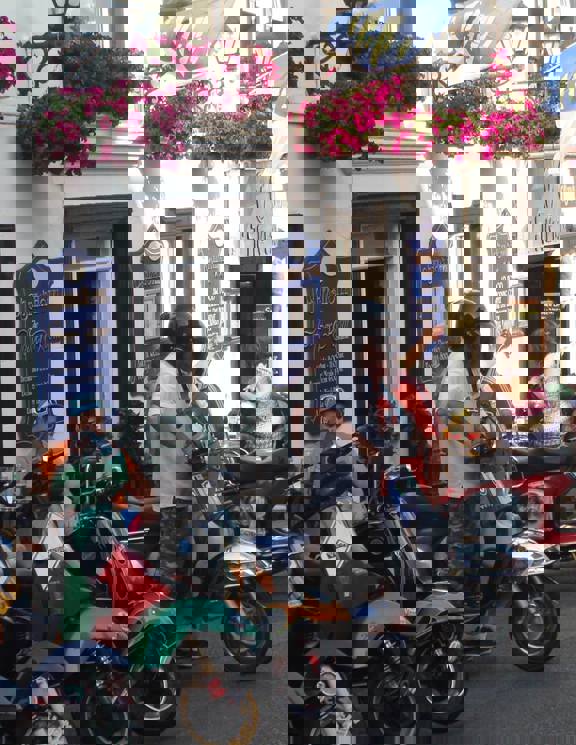 Vespas In Front Of Hotel